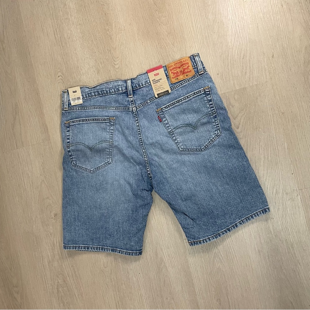 Levi’s 405 Distressed Jean (Jorts) Shorts “Light Wash”